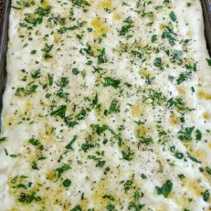 Oiled, herbed and parmed focaccia