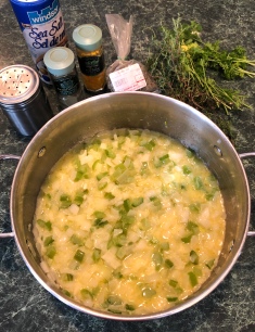 Cooking the celery and onions in the butter